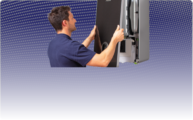 Cover being put on boiler after servicing
